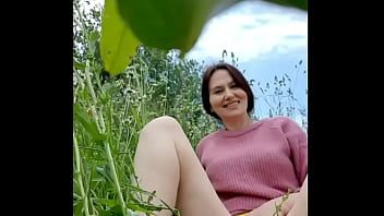 Play Naked horny MILF in a chamomile field masturbates, pisses and wards off a wasp / Angela-MILF