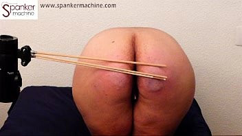 Play Spanker Machine paddle and cane